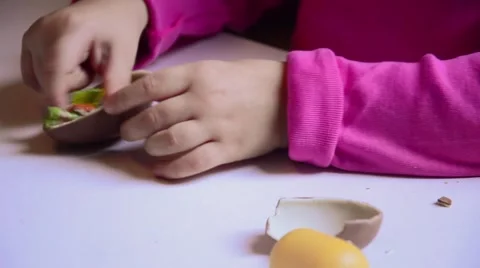 Child and surprise egg Stock Footage 43375836