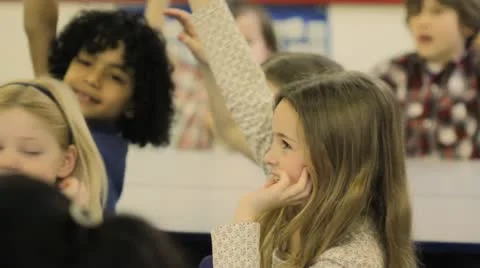 Child answering a question in school Stock-Footage 22663888