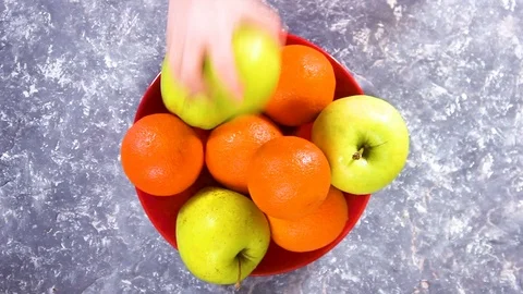 Child with apples and oranges. Stock Footage 87793032