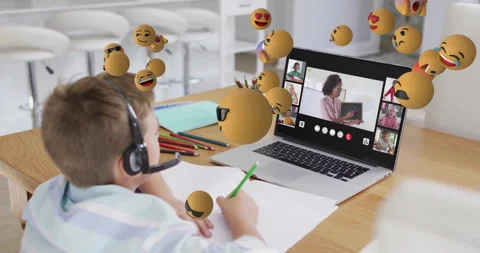 Child attending online class with floating emoji animations around laptop screen Stock Footage 303565942