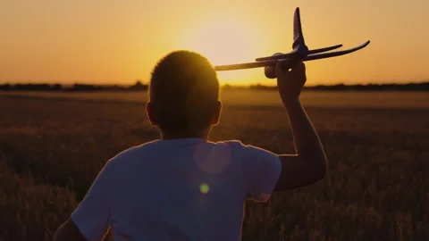Child aviator close-up. Boy pilot takes off. Teenage boy dreams of flying Stock Footage 305596611