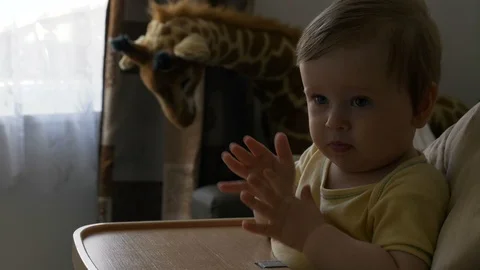 A child baby boy clapping hands while Stock Video Pond5