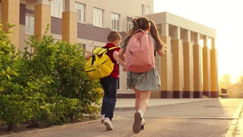Child backpack school running lesson laughter friend. portrait student smile Stock Footage 238422348