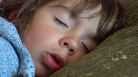 Child badly coughing in his sleep Stock Footage