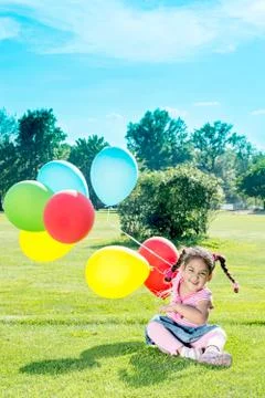 Child with balloons Stock Photos