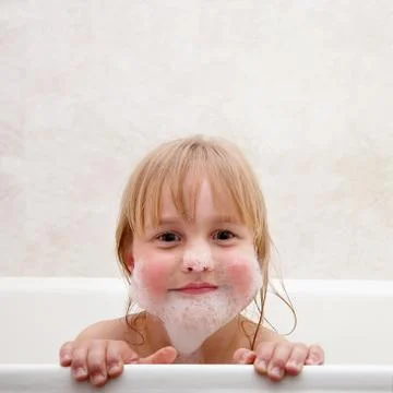 The child is bathed Stock Photos