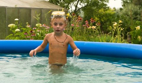 The child bathes. Stock Photos