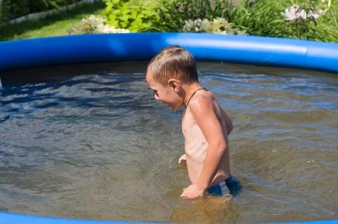 The child bathes. Stock Photos