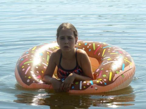 Child bathes in the river Stock Photos