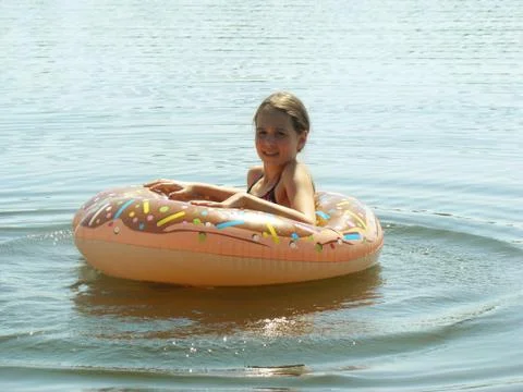 Child bathes in the river Stock Photos