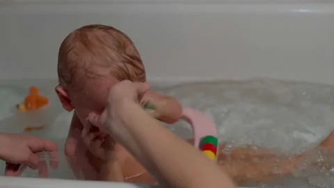 The child is bathing 스톡 동영상 170323892