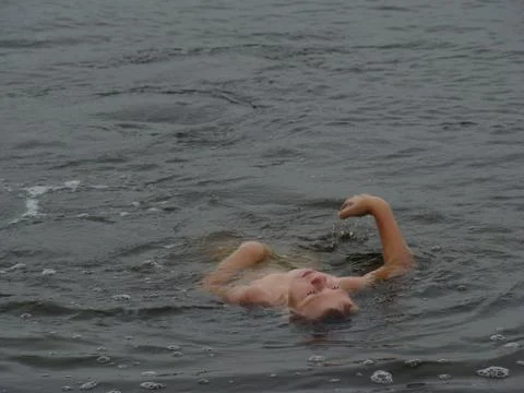 Child is bathing in the river Stock-Fotos