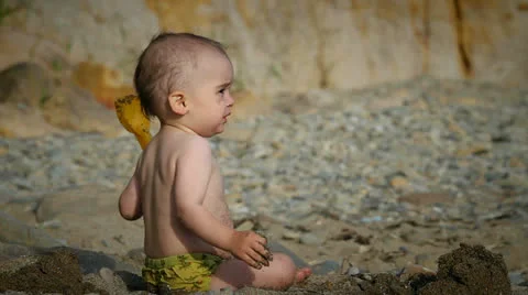 Child on the beach Stock Footage 25540933