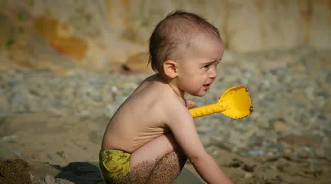 Child on the beach Stock Footage 25540934
