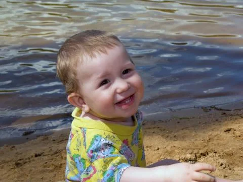 Child on beach Stock Photos