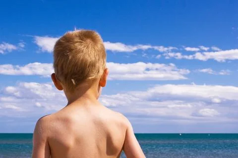 Child on a beach Stock Photos