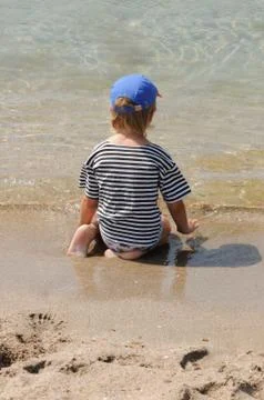 Child on beach Stock Photos
