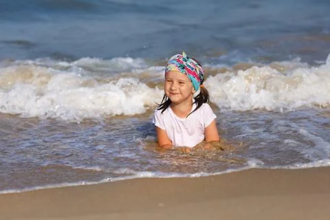 Child on the beach Stock Photos