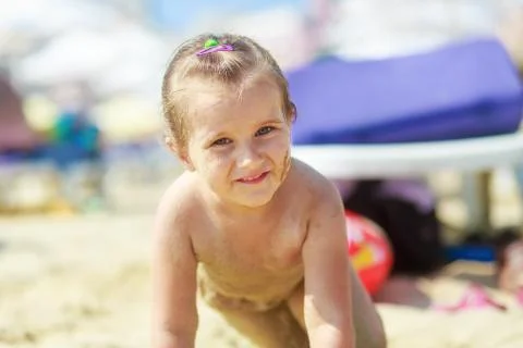 Child on the beach Stock Photos