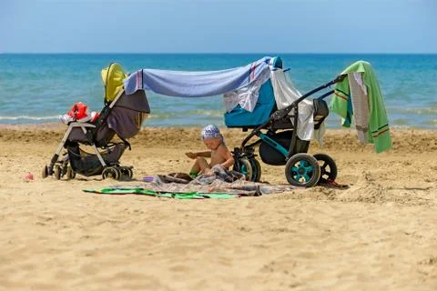 Child on the beach Stock Photos