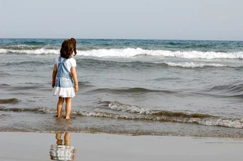 Child on beach Stock Photos