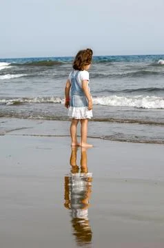 Child on beach Stock Photos