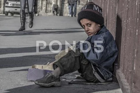 A child begging Stock Photos