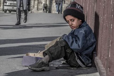 A child begging Stock Photos