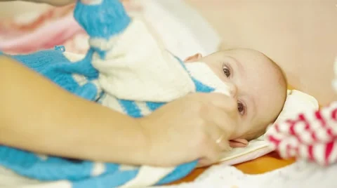 Child Is Being Dressed Video stock 52688534