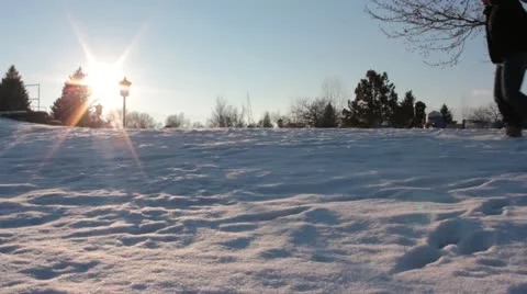 Child being pulled in the snow Video stock 18065120