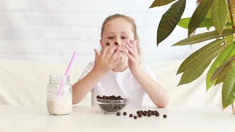 A child with berries Stock Footage 157182139