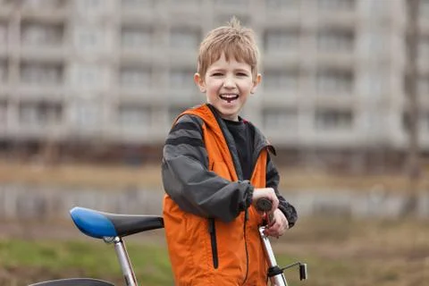 Child with bicycle Stock Photos
