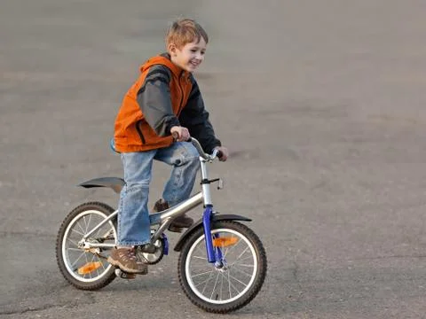 Child with bicycle Stock Photos