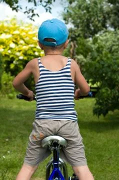 The child on a bicycle. Stock Photos