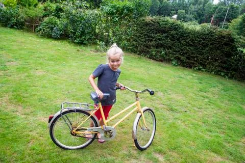 Child with bicycle Stock Photos
