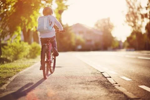 Child on a bicycle Stock Photos