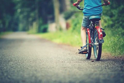 Child on a bicycle Stock Photos