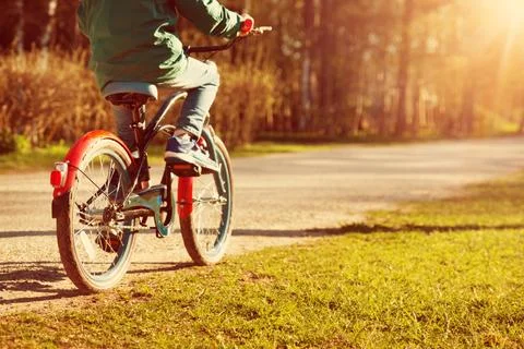 Child on a bicycle Stock Photos