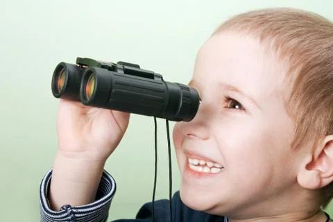 Child with binoculars Stock Photos