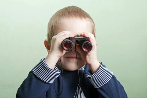 Child with binoculars Stock Photos