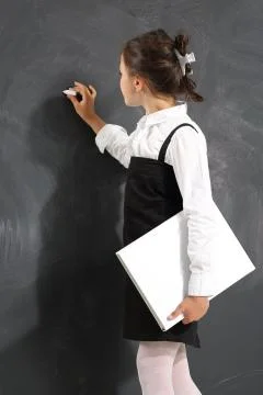 A child at the blackboard  Stock Photos