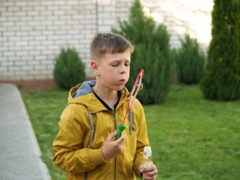 Child blow bubbles Stock Photos