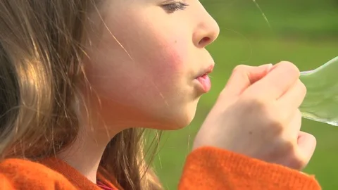 Child Blowing Bubbles Stock Footage 88507548