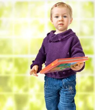 Child with a book Stock Photos