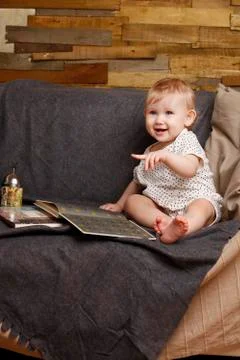 Child with a book Stock Photos