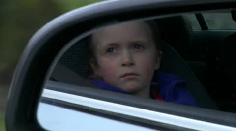 Child bored in car Stock Footage 22636623