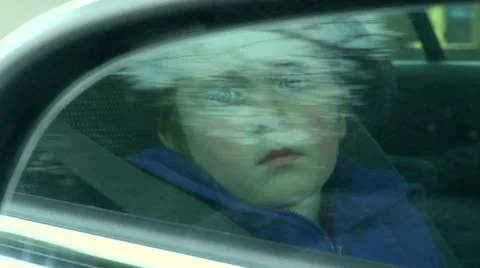 Child bored in car Stock Footage 22636628