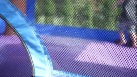 Child Bouncing in Bounce House for Birthday Party Stock Footage 317522997