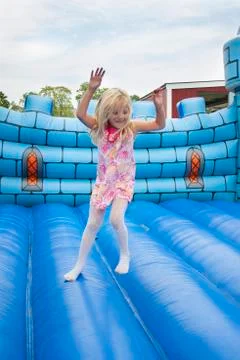 Child in bouncing castle Stock Photos