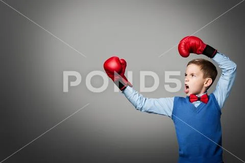 Child in Boxing Gloves, Elegant Kid Boy Boxer Raised Arms Up, Young Fighter Stock Photos